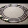 Video: Experiments with a distributed control of a platoon of slotcars 